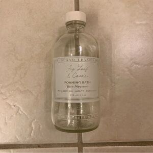 Free item: Empty glass bottle with white lettering